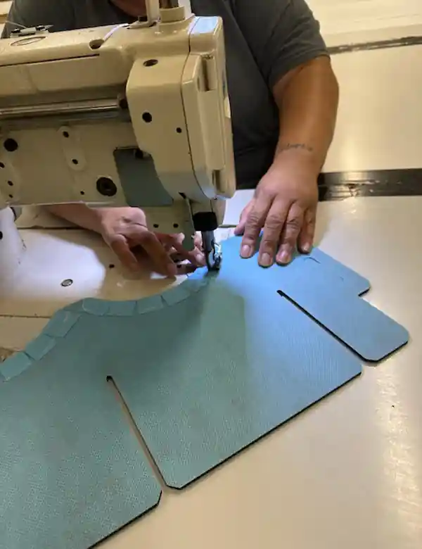 person sewing textiles